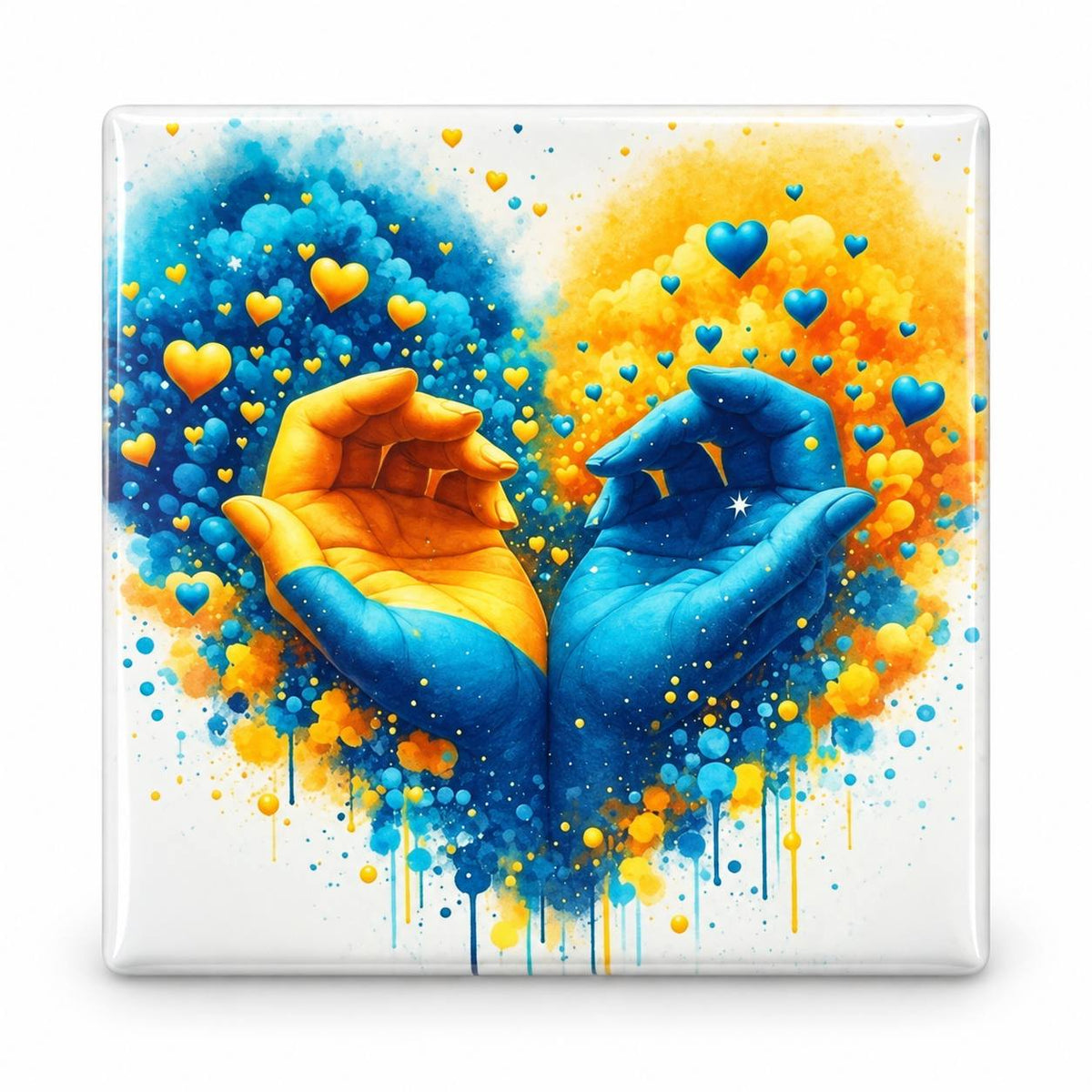 Colorful fridge magnet with blue and yellow hands surrounded by small hearts and colorful splashes
