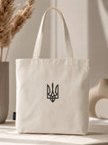 Natural-color tote bag with a small black Ukrainian trident